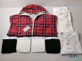 a red and white plaid shirt, white pants, and a red and black jacket