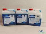 three gallons of cleaning liquid sitting on top of each other
