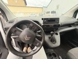 a picture of a car with a steering wheel and dashboard