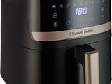 a close up of an air fryer on a white background
