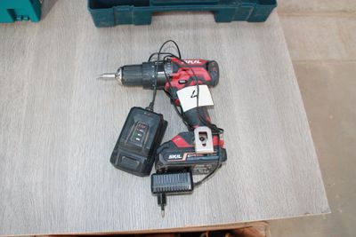 two tools that are sitting on a table