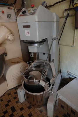 an image of a kitchen with a mixer and other appliances