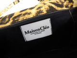 a close up of a purse with a label on it