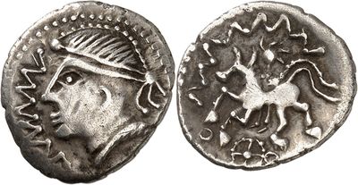 a silver coin with an image of a man on it