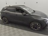 a grey suv parked in a garage with a checkered floor
