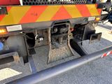 an image of a truck that is parked on the street