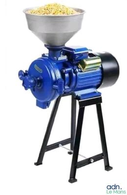 un gros plan d'une machine sur laquelle est posé un bol de nourriture