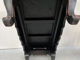 a black chair that is sitting on the floor