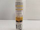 a close up of a tube of glue sitting on a table