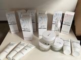 many different types of skin care products on a table