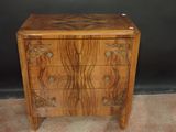 an image of a wooden chest of drawers