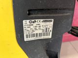 a close up of a parking meter with a barcode on it