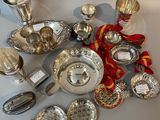 a lot of silver items that are on the table