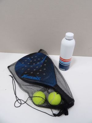 two tennis balls in a mesh bag next to a bottle of water