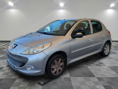 a picture of a silver car parked in a garage