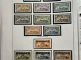 an open book with a bunch of different stamps on it