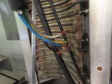 a close up of a machine that has wires in it