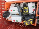 a box full of electronic equipment on a red table