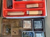 a box full of assorted items sitting on a table