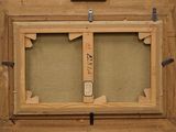 a picture of a wooden frame with a picture on it