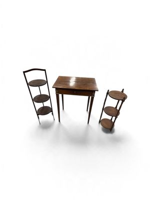 an image of a small table and two chairs on a white background