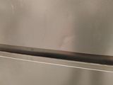 an image of a stainless steel refrigerator in a kitchen
