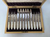 a box that has a set of silverware in it