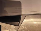 a close up of a cell phone on top of a sink