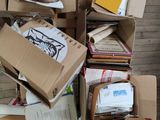 a pile of boxes that are sitting on the floor