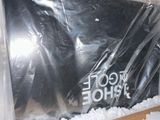 a plastic bag with a picture of a cat inside of it