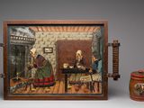 une photo d'une photo représentant une femme et un homme assis à une table