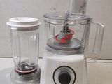 a blender and a blender sitting on a counter
