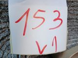 a person holding a piece of paper with a number on it