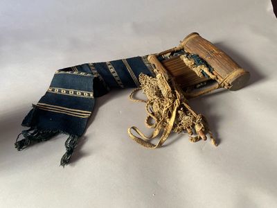 a small piece of cloth that is laying on a table