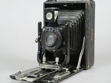 an old camera that is sitting on a table