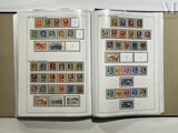 a book with stamps on it sitting on a table
