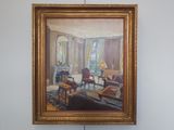 un tableau accroché au mur d'un salon