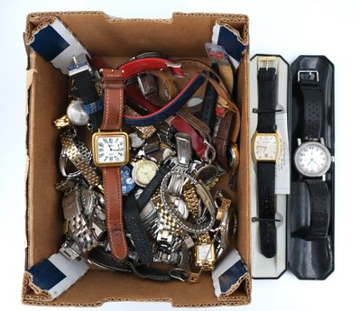 a box full of assorted watches and other items