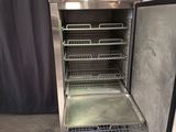 an image of a stainless steel freezer with a door open