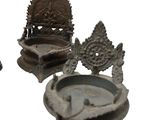 three small metal objects sitting next to each other