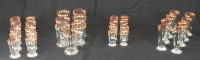 six glass vases are lined up in a row on a black background