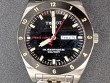 a close up of a wrist watch on a table