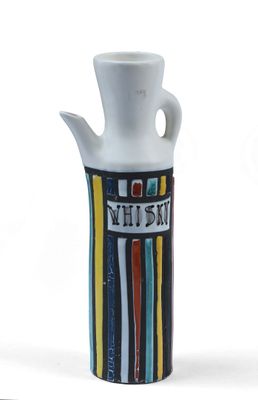 a white vase that has a colorful design on it