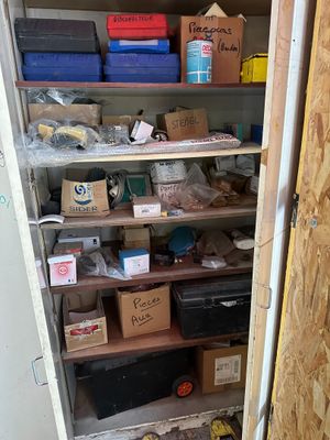 many boxes and boxes on the shelves in the room