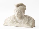 a white statue of a woman with a hat on her head