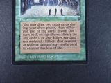 a picture of a card with a picture of a person in the background