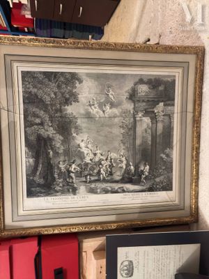 a picture of a painting hanging on a wall next to a pile of books
