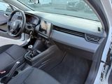 a car with a steering wheel and a dash board