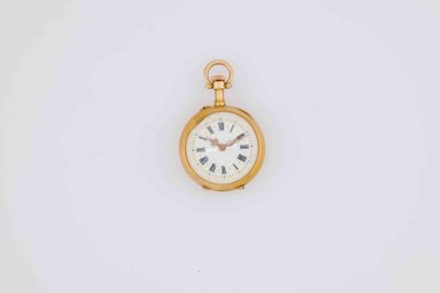 an image of a gold pocket watch with roman numerals on the face