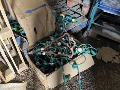 a cardboard box filled with lots of wires and wires